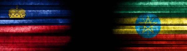 Liechtenstein Och Etiopien Flaggor Med Svart Bakgrund — Stockfoto