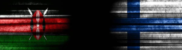 Flaggen Kenias Und Finnlands Auf Schwarzem Hintergrund — Stockfoto