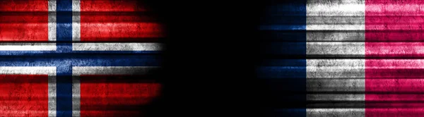 Norway and France Flags on Black Background