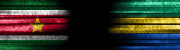 Banderas Surinam Gabón Sobre Fondo Negro —  Fotos de Stock