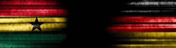 加纳和德国黑色背景旗 — 图库照片