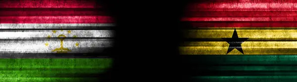 Tadschikistan Und Ghana Flaggen Auf Schwarzem Hintergrund — Stockfoto