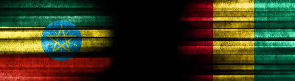 エチオピアとギニアの旗 黒い背景 — ストック写真