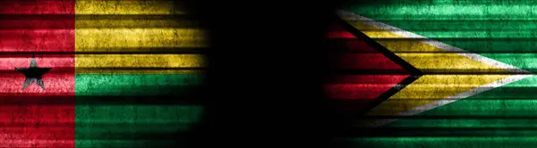 Σημαίες Γουινέας Μπισσάου Και Γουιάνας Μαύρο Φόντο — Φωτογραφία Αρχείου