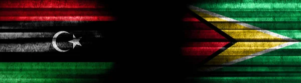 Libya Guyana Flags Black Background — Stock Photo, Image
