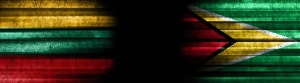 Litauen Och Guyana Flaggor Svart Bakgrund — Stockfoto