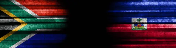 Südafrika Und Haiti Flaggen Auf Schwarzem Hintergrund — Stockfoto