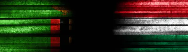 Zambia and Hungary Flags on Black Background