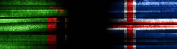赞比亚和冰岛关于黑人背景的旗帜 — 图库照片