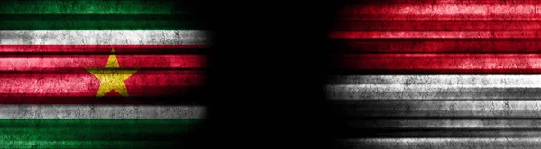 Surinam Indonezja Flagi Czarnym Tle — Zdjęcie stockowe