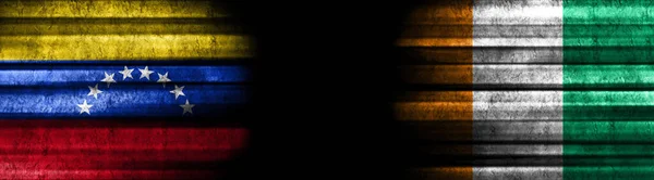 Σημαίες Βενεζουέλας Και Ακτής Ελεφαντοστού Μαύρο Φόντο — Φωτογραφία Αρχείου