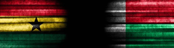 Γκάνα Και Μαδαγασκάρη Σημαίες Μαύρο Φόντο — Φωτογραφία Αρχείου
