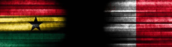 Ghana Och Maltas Flaggor Med Svart Bakgrund — Stockfoto