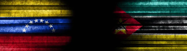 Venezuela Mozambik Zászlók Fekete Háttér — Stock Fotó