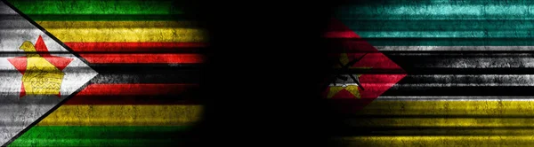 Zimbabwe Mosambické Vlajky Černém Pozadí — Stock fotografie