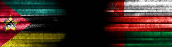 Mozambique Oman Flags Black Background — Stock Photo, Image