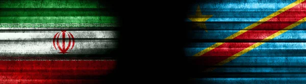 Iran and Democratic Republic of Congo Flags on Black Background