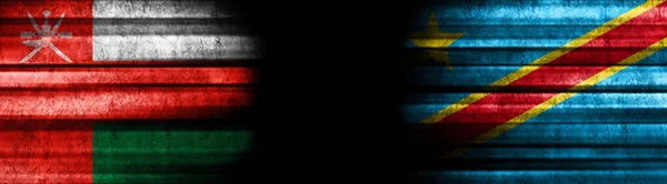 Oman and Democratic Republic of Congo Flags on Black Background