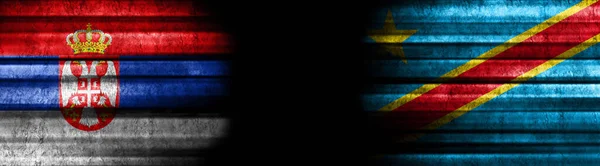 Serbia and Democratic Republic of Congo Flags on Black Background