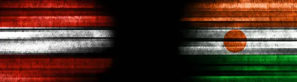 Σημαίες Αυστρίας Και Νίγηρα Μαύρο Φόντο — Φωτογραφία Αρχείου