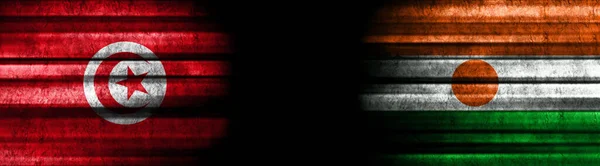 Tunisia and Niger Flags on Black Background