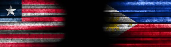 Liberia and Philippines Flags on Black Background