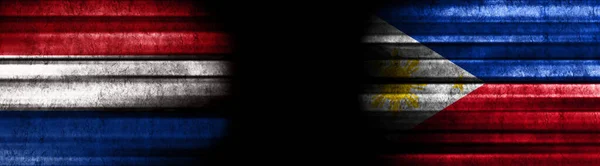 Kara Arkaplanda Hollanda Filipinler Bayrakları — Stok fotoğraf