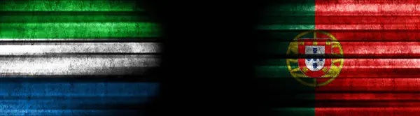 ブラックバックグラウンドのシエラレオネとポルトガルの旗 — ストック写真