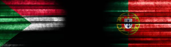 ブラックバックグラウンドのスーダンとポルトガルの旗 — ストック写真