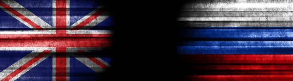 Verenigd Koninkrijk Rusland Vlaggen Zwarte Achtergrond — Stockfoto