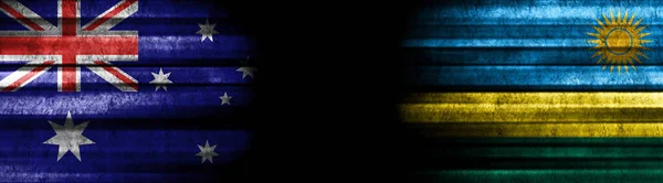 Australia and Rwanda Flags on Black Background