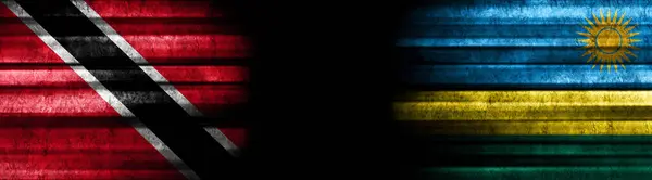 Flaggen Von Trinidad Und Tobago Und Ruanda Auf Schwarzem Hintergrund — Stockfoto