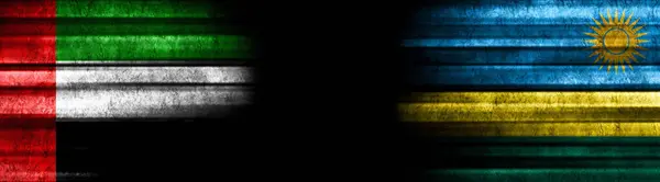 Emiratos Árabes Unidos Ruanda Banderas Sobre Fondo Negro — Foto de Stock
