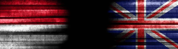 Bandeiras Indonésia Reino Unido Sobre Fundo Preto — Fotografia de Stock
