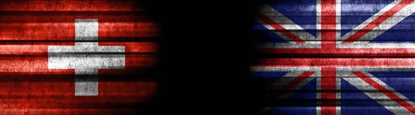 Zwitserland Verenigd Koninkrijk Vlaggen Zwarte Achtergrond — Stockfoto