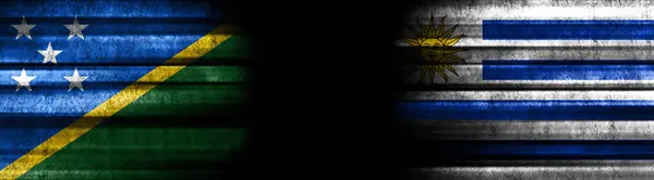 Solomon Islands and Uruguay Flags on Black Background