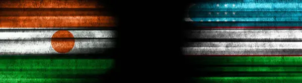 Σημαίες Του Νίγηρα Και Του Ουζμπεκιστάν Μαύρο Φόντο — Φωτογραφία Αρχείου