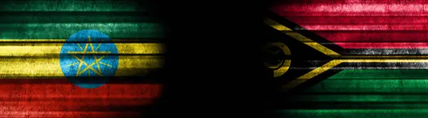 エチオピアとバヌアツの黒い背景の旗 — ストック写真