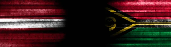 Flagi Łotwy Vanuatu Czarnym Tle — Zdjęcie stockowe