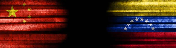 stock image China and Venezuela Flags on Black Background