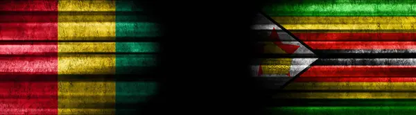 Bandeiras Guiné Zimbabué Sobre Fundo Preto — Fotografia de Stock