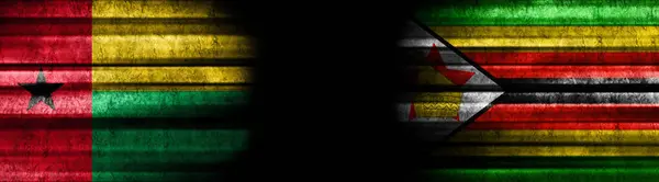 Banderas Guinea Bissau Zimbabwe Sobre Fondo Negro — Foto de Stock