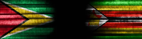 Bandeiras Guiana Zimbábue Fundo Preto — Fotografia de Stock