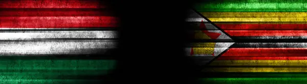 Kara Arkaplanda Macaristan Zimbabwe Bayrakları — Stok fotoğraf