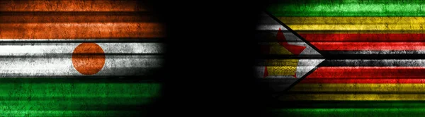 Banderas Níger Zimbabue Sobre Fondo Negro —  Fotos de Stock