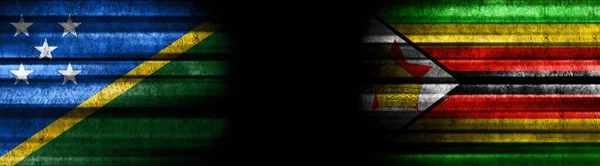 Solomon Islands and Zimbabwe Flags on Black Background