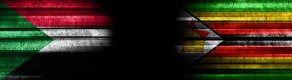 Flaggen Des Sudan Und Simbabwes Auf Schwarzem Hintergrund — Stockfoto