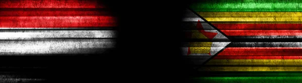 Bandeiras Iêmen Zimbábue Fundo Preto — Fotografia de Stock