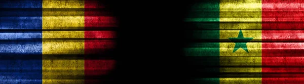 Románia Szenegál Zászlók Fekete Háttér — Stock Fotó