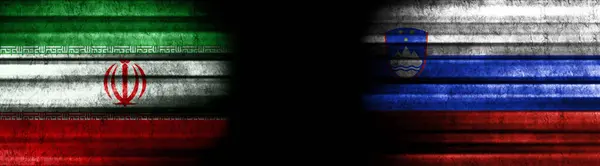 Iran and Slovenia Flags on Black Background